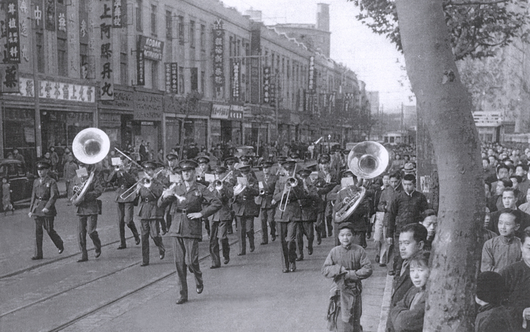 The United States Marine Corps Fourth Regiment Band marching in Shanghai, China on November 28, 1941 only ten days before the December 7, 1941 attack by the Japanese Empire against the United States at Pearl Harbor, Hawaii and Manila Bay, Philippine Islands.